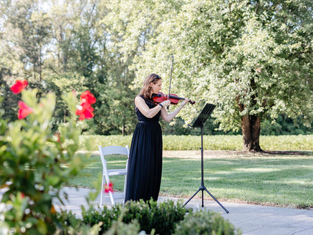 Jaimi Grether playing a romantic song during a wedding ceremony
