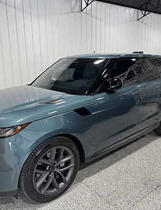 Teal Range Rover Sport with SunTek ceramic window tint in the Full Spectrum studio