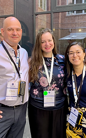 Aline Quadros, Dânia Meira, and Chris Armbruster.png