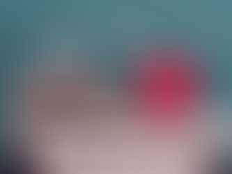 Open book with red apple symbolising primary education and Key Stage 2 attainment in the UK.