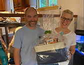Customers receiving Greek Food Gift Basket from Mazee Gifts and Classes