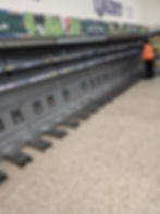 Empty dairy aisle shelves in a supermarket gallery