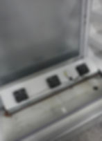 Commercial refrigerator cooling fans in a gallery display
