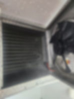 HVAC cooling coils and fan in a maintenance gallery