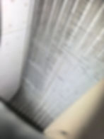 Close-up of metal fins on an HVAC evaporator coil