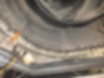 Dirty HVAC blower wheel in gallery show casing dust buildup
