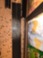 Black metal panels in a snack gallery display