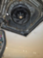 Industrial fan unit in a ceiling gallery display