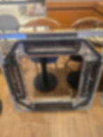 Disassembled air conditioning unit in a gallery setting.