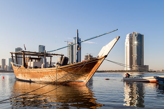 sailboats-moored-sea-against-clear-sky.jpg