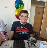Person playing bingo at Ambition Links Day Service