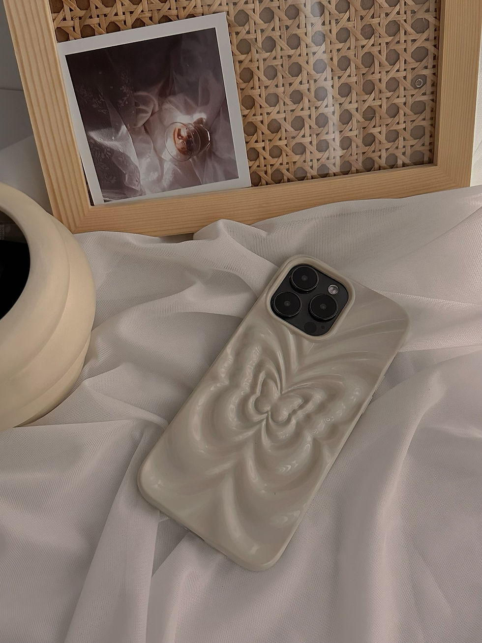 Chic white iPhone 14 case with a unique butterfly pattern. This stylish and protective case is the perfect accessory for those who want to stand out. #iphonecase #phonecase #whitecase #butterfly #stylish #protective #tech #fashion