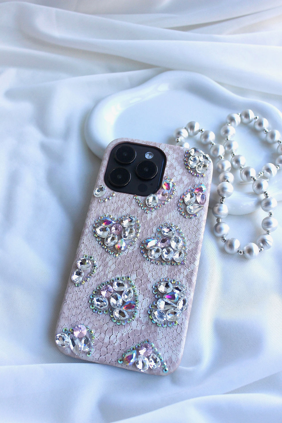 Thumbnail: Glamorous pink iPhone 14 Pro Max case featuring a dazzling rhinestone design. This case is both stylish and protective, making it the ideal choice for those who want to stand out. Rose gold phone case #iphonecase #phonecase #pinkcase #rhinestone #glamorous #protective #style #Rose #Gold