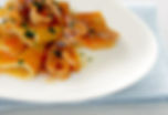 Mezzi paccheri, calamari e pomodori datterini