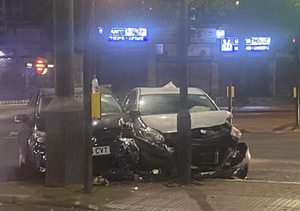 Two London private hire vehicles smash into lights simultaneously Two London private hire vehicles smash into lights simultaneously
