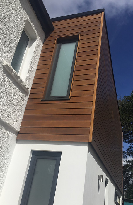 modern 2 storey side extension with cedar wood cladding