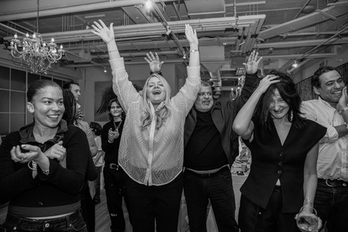 Guests having fun and dancing at Birthday Party at Bluebird Chelsea, London Event Photography, Natural, Candid, Documentary, Black and White