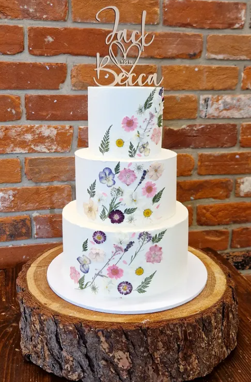 Cascade of pressed edible flowers in pastels at Westerham Golf Club