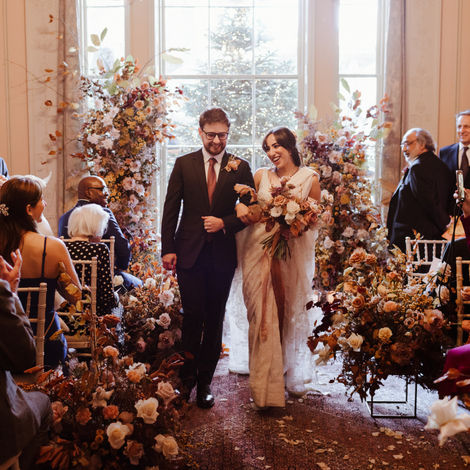 Sara and Tom on their wedding day, a fusion wedding by Jenna Hewitt, London wedding planner 