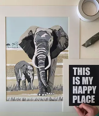A close up of the Elephant print with baby calf and fun slogan phrase