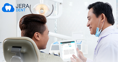asian-male-dentist-demonstrating-jaw-x-ray-image-tablet-patient.png