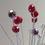 Thumbnail: Red, silver, clear plastic rondelle bead caketopper