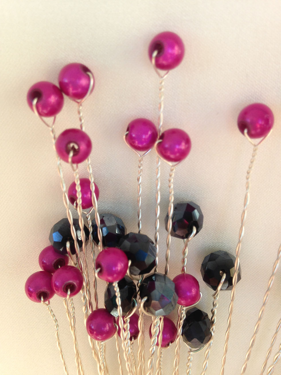 Thumbnail: Cerise miracle bead & black rondelle caketopper