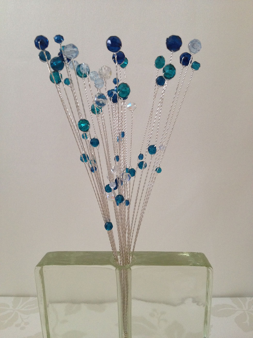 Thumbnail: Turquoise, blue and clear plastic rondelle bead caketopper,  table decoration