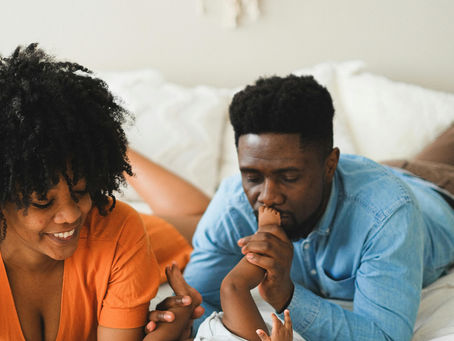 A man and his wife together with their daughter.