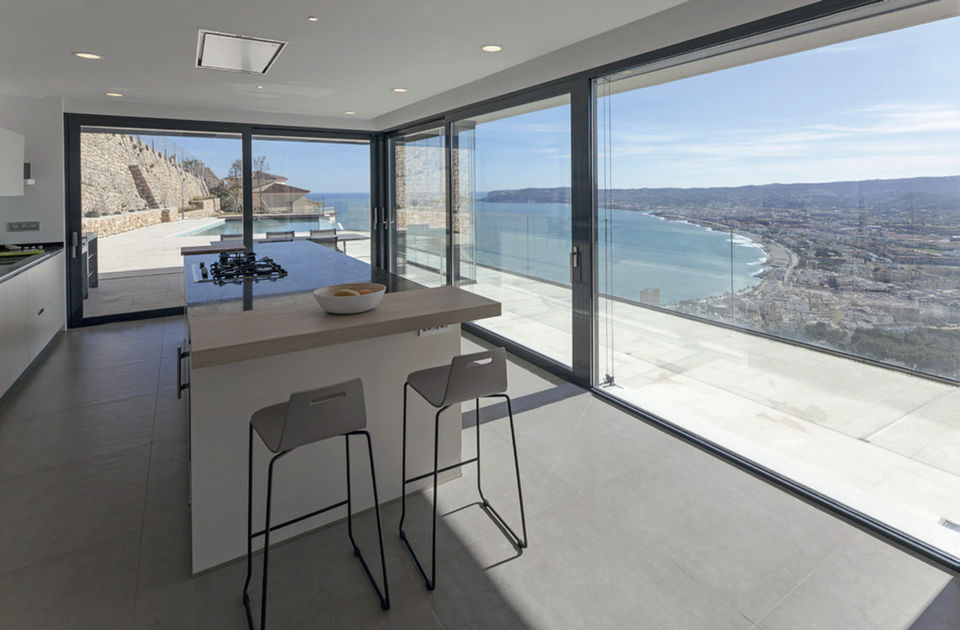 Sliding Doors open up to your views from www.glasshousearchitecture.co.uk