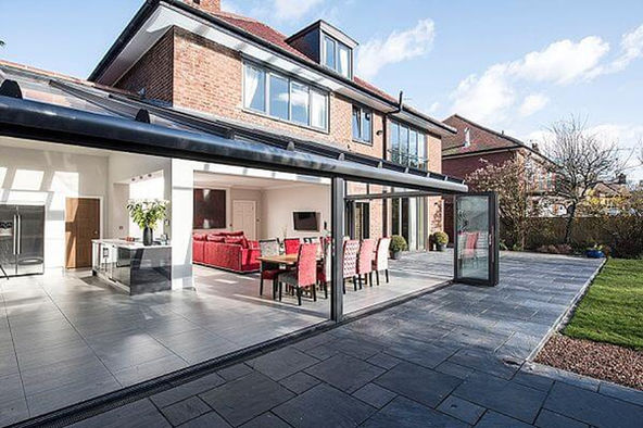 Case Study Winter Garden Bifolding Doors Open from glasshousearchitecture.co.uk