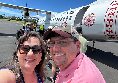 Jodi Wooten and her husband boarding an international flight for their next adventure.