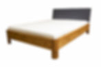 Wooden bed frame with mattress and dark headrest