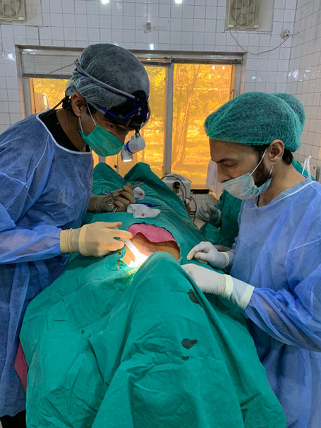 Dr Omar Hussain operating 