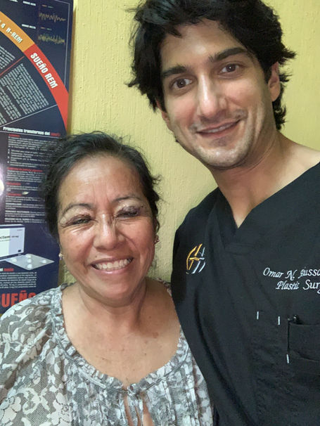 Dr Omar Hussain and patient 