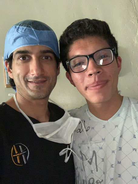 Dr Omar Hussain and patient 