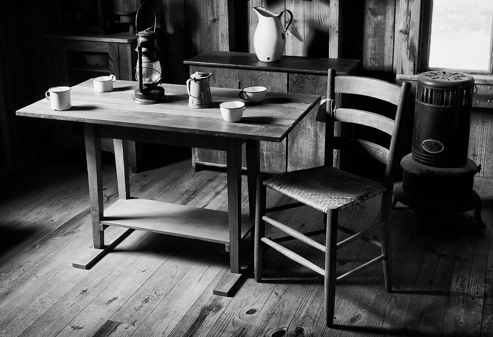 1800's kitchen from the Koreshan historical site in Estero, Florida. Photographed in black and white.