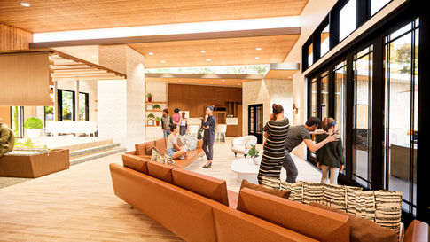 Modular light brown leather sofas with accent chairs and coffee table in living room.