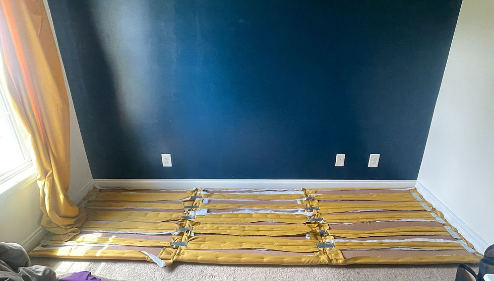 The backside of the panels showing the staples and how they are attached to one another using 5 inch tie straps.