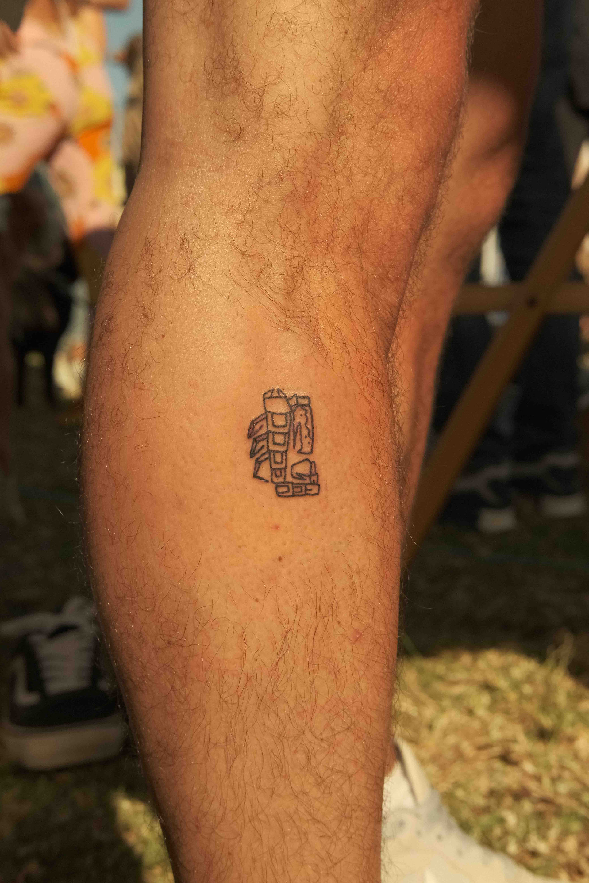 Abstract Scorpio tattoo in linework style, created in Portugal's Algarve region, specifically in Sagres and Lagos. The design features intricate lines forming the Scorpio symbol with artistic flair.