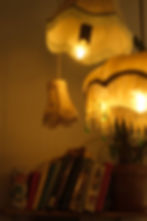 Warm light inside a quiet tattoo studio in the Algarve