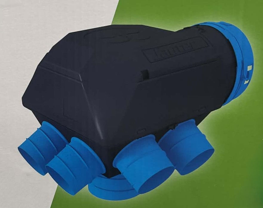 On voit un caisson de vmc simple flux hygroréglable avec piquages pour raccordement gaines