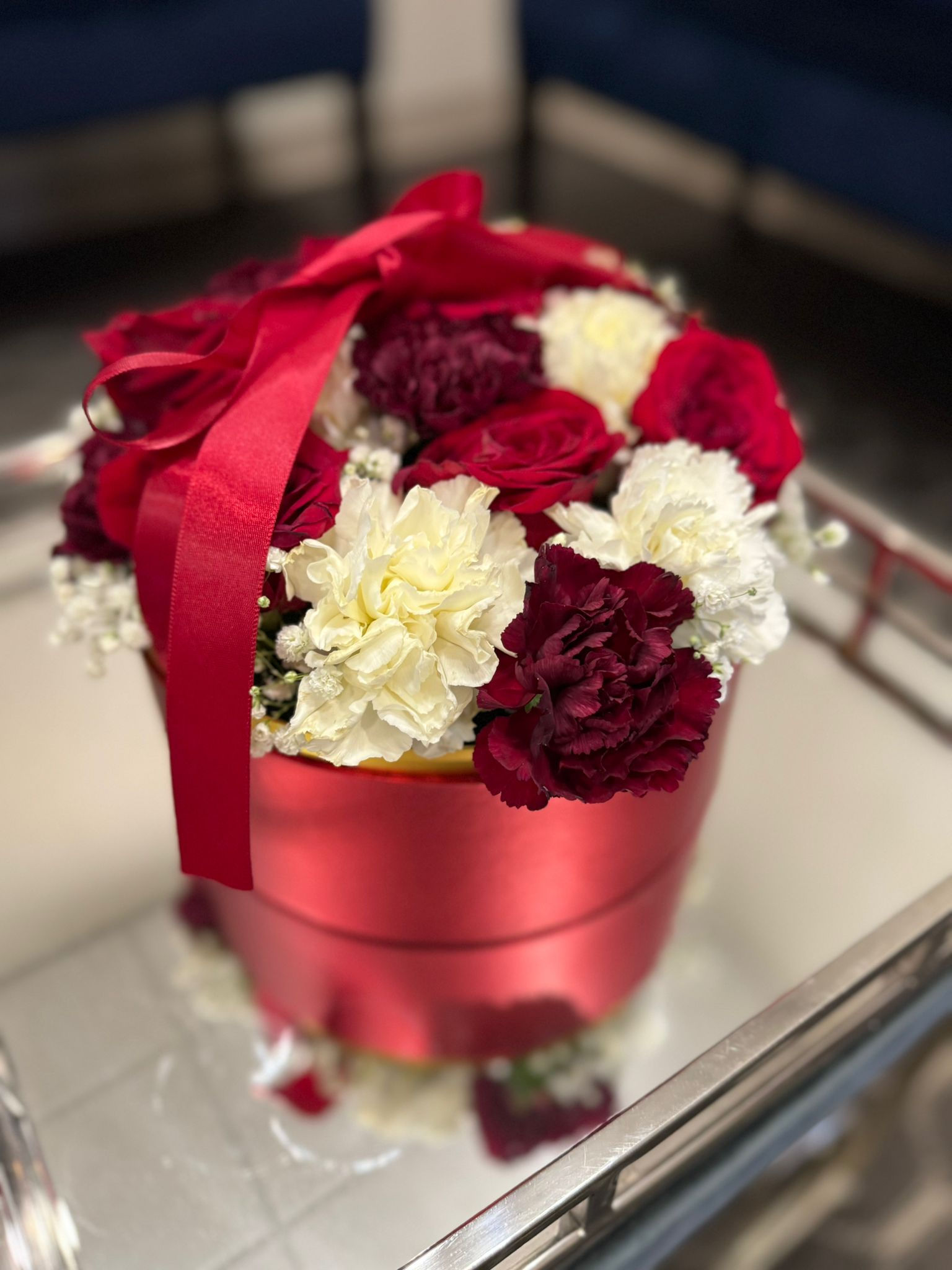 Carnations and red roses, flower arrangement