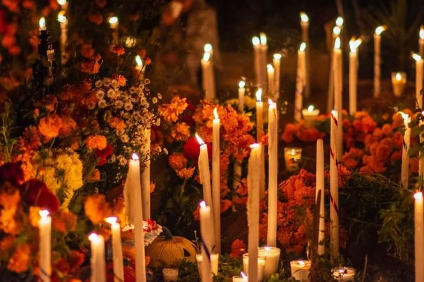 cropped_All_Souls_Day_candles_grave_yard_death_vigil_via_Getty.webp