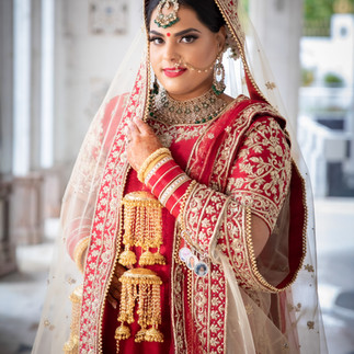 couple posing for sikh wedding