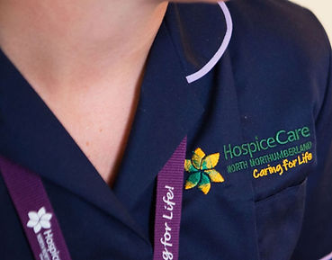 Image of our logo on uniform_edited.jpg