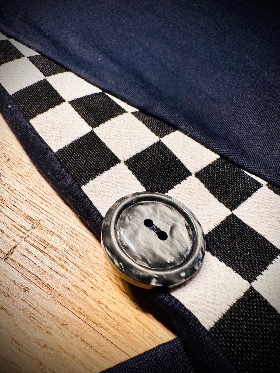 Écharpe en jacquard à damiers noir et blanc