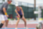 A mixed doubles team competes in a pickleball tournament.jpg