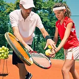 Tennis lesson - instructor working with .webp