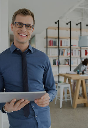 Professional Man Holding a Tablet_edited.jpg